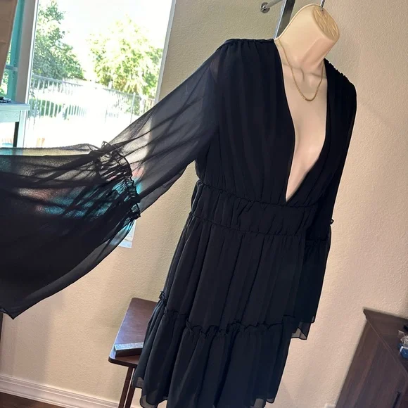Black Boho dress with a sexy flare. - Picture 3 of 4